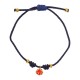 Pulsera con concha esmaltada en rojo sobre cordón azul