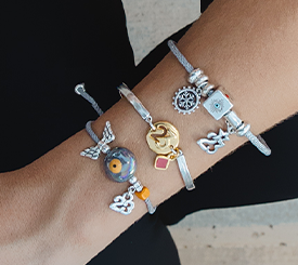 BRACELETS W/ LUCKY CHARMS