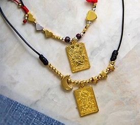 NECKLACES W/ GOLD TAGS